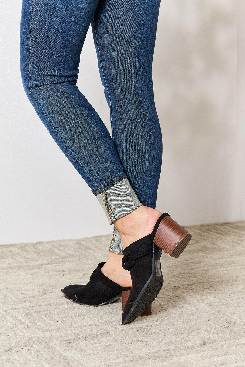 Pointed-Toe Braided Trim Mules.