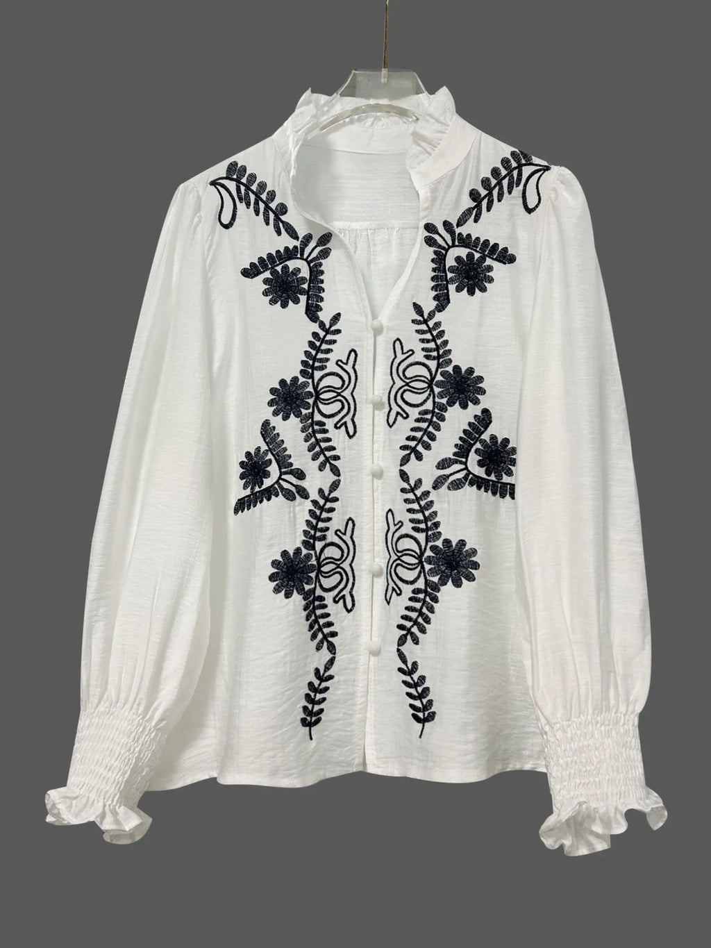 Embroidered Long Sleeve Blouse.