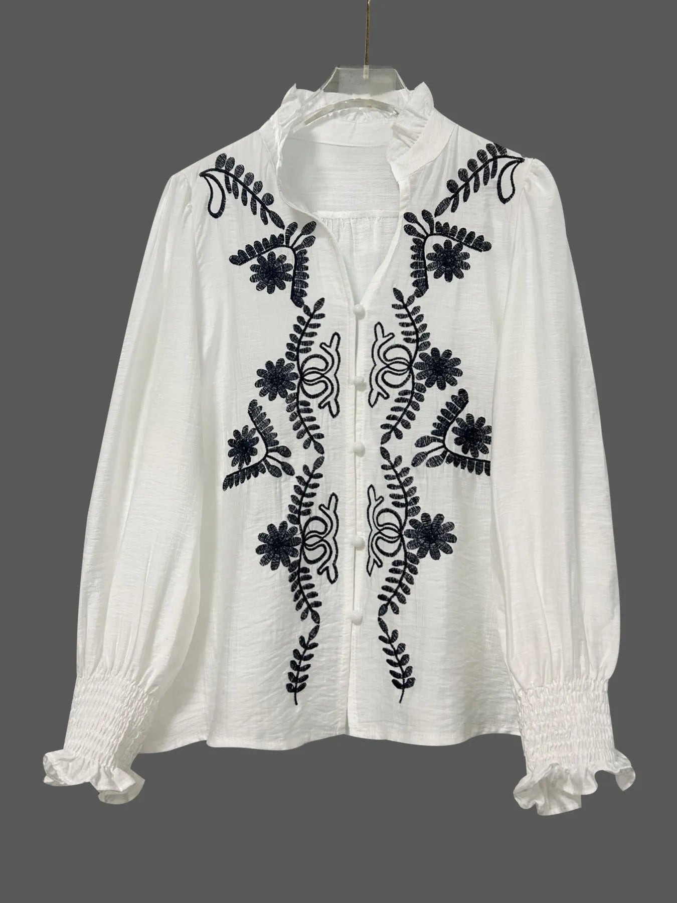 Embroidered Long Sleeve Blouse.