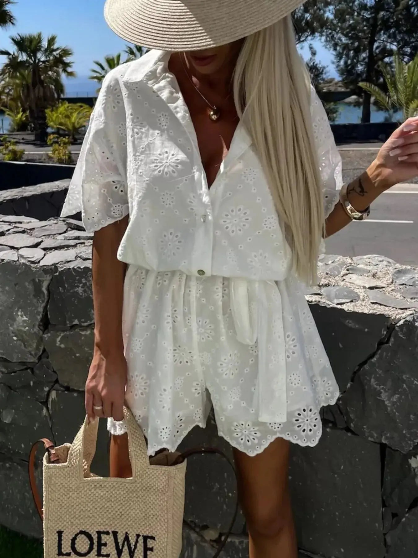 Eyelet Lace Button-Up Romper.