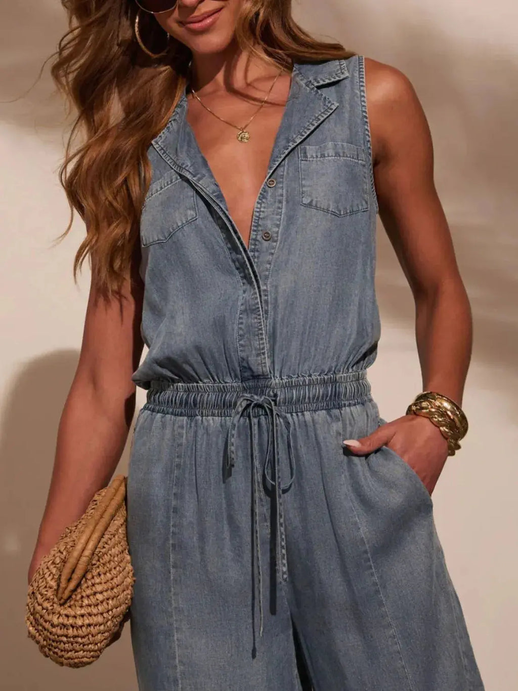 Sleeveless Drawstring Waist Washed Denim Jumpsuit.