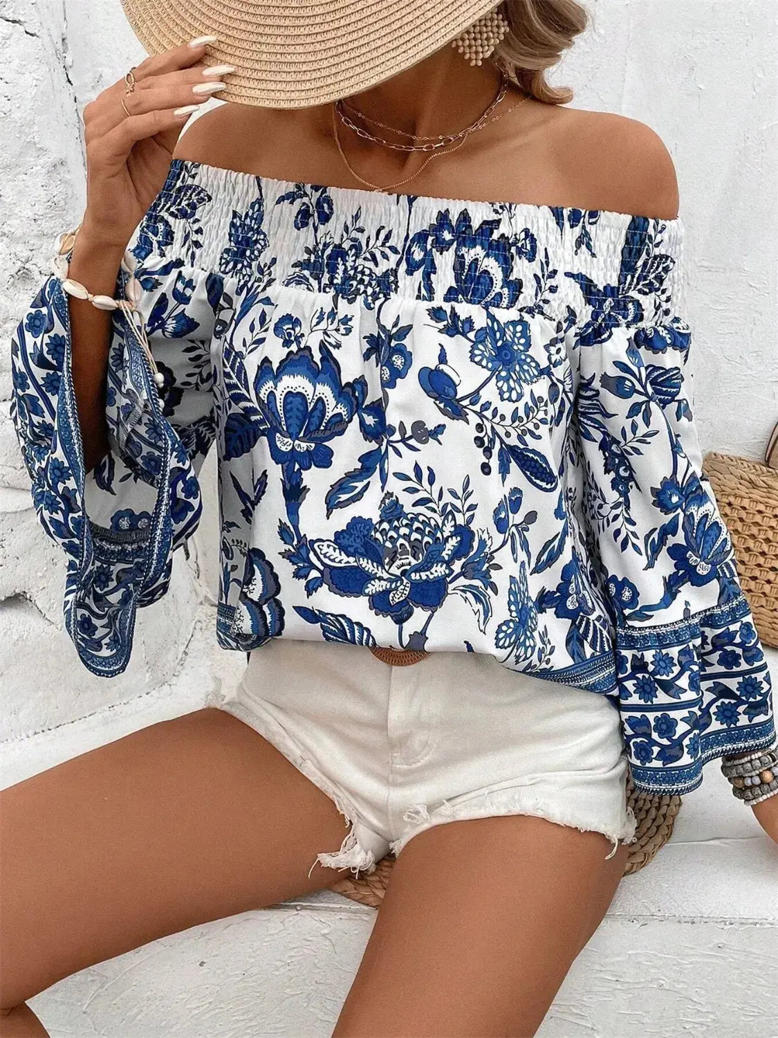 Smocked Printed Off-Shoulder Blouse.