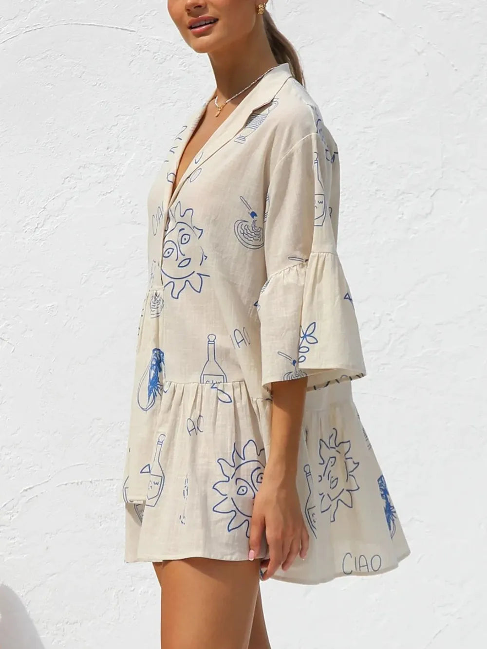 Button Detail Printed Mini Dress.