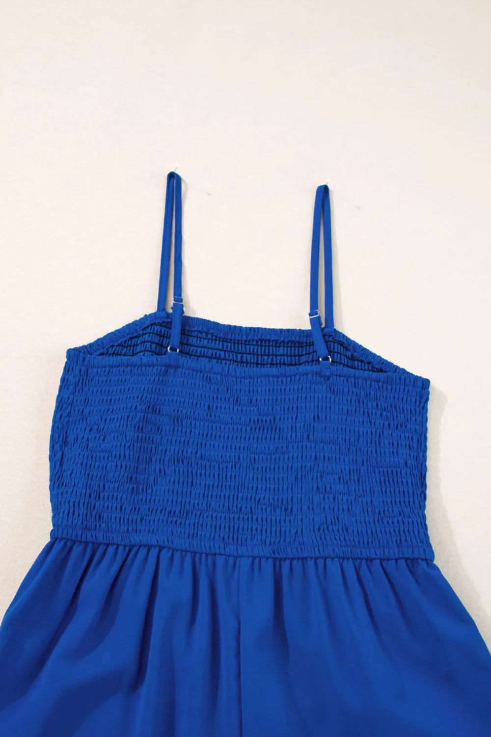 Spaghetti Straps Smocked Ruffled Wide Leg Jumpsuit.