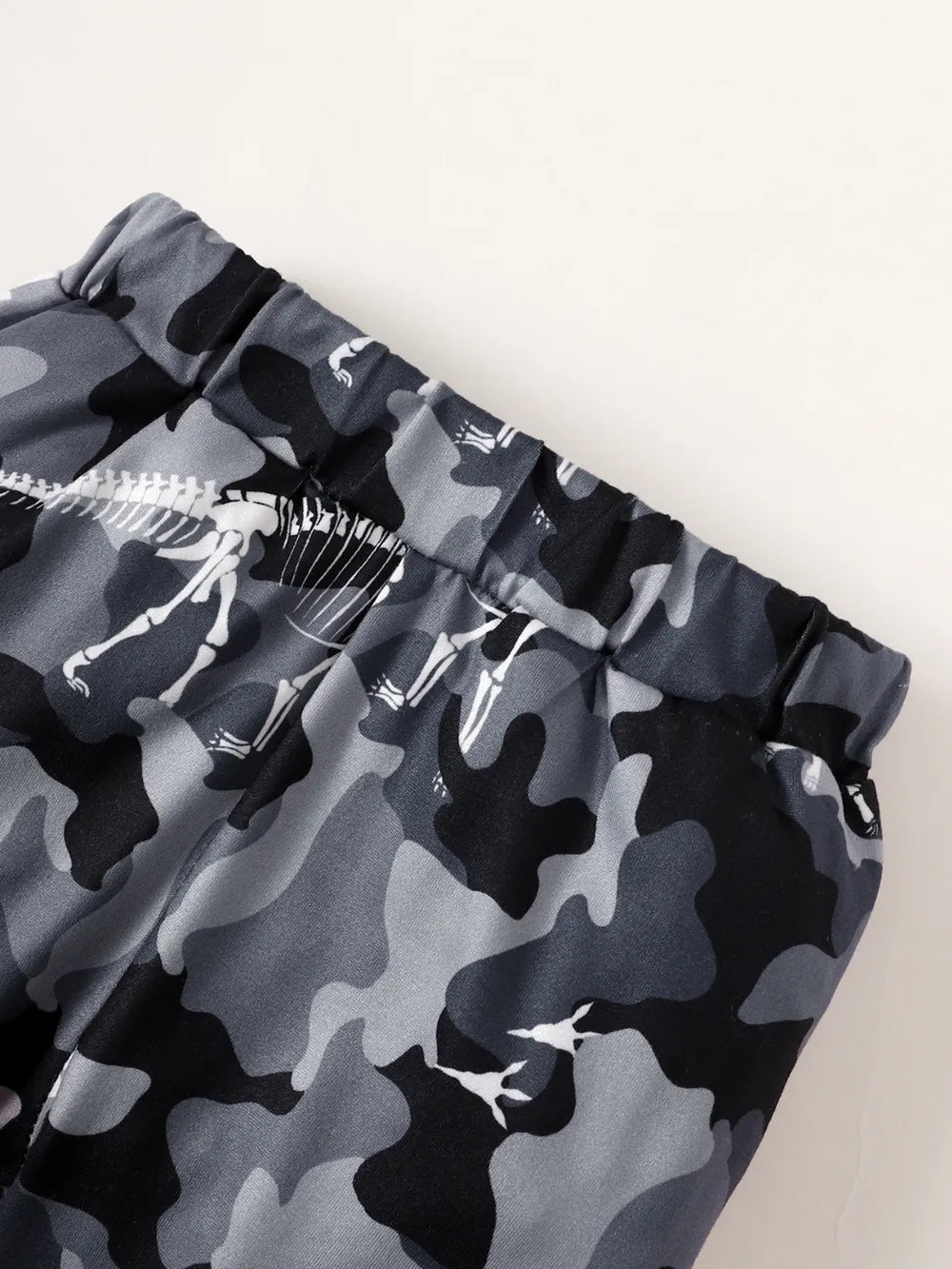 Children's Striped Hooded Bodysuit and Camouflage Pants Set.