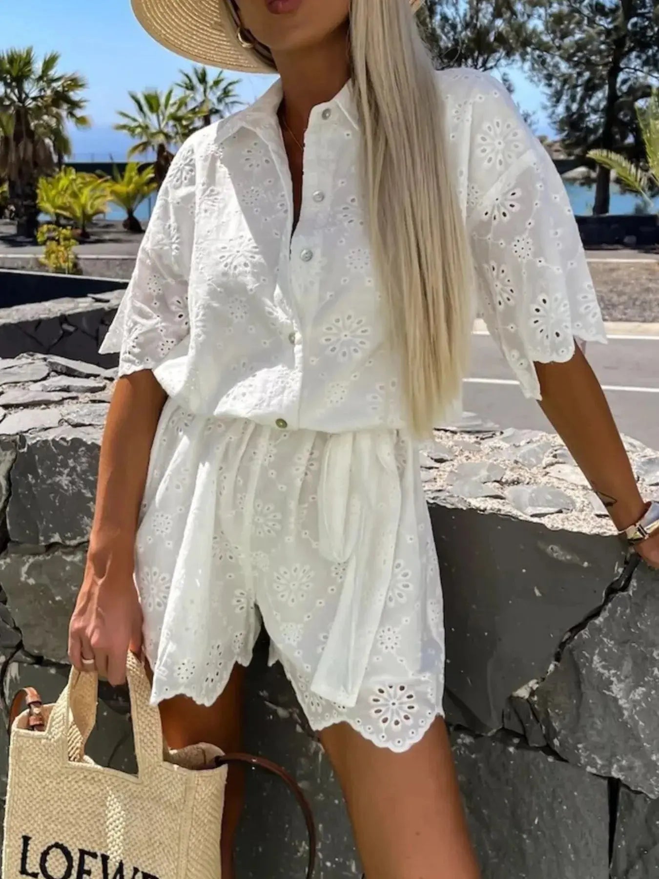 Eyelet Lace Button-Up Romper.