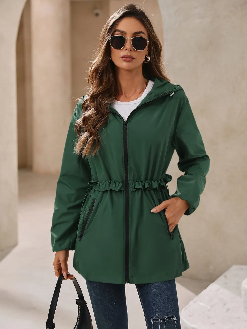 Ivy Lane Outdoor Waterproof Long Sleeve Hooded Windbreaker.