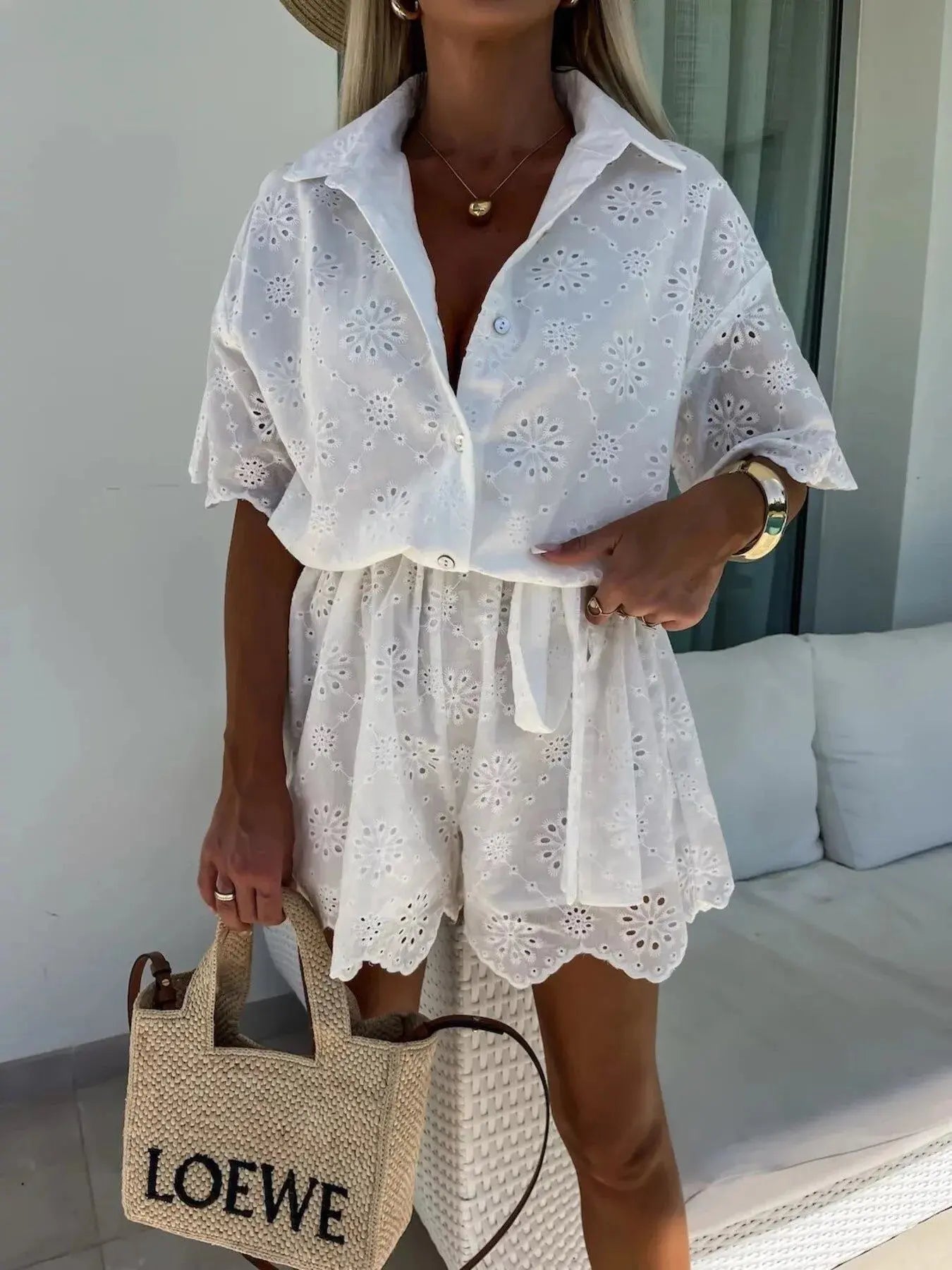 Eyelet Lace Button-Up Romper.