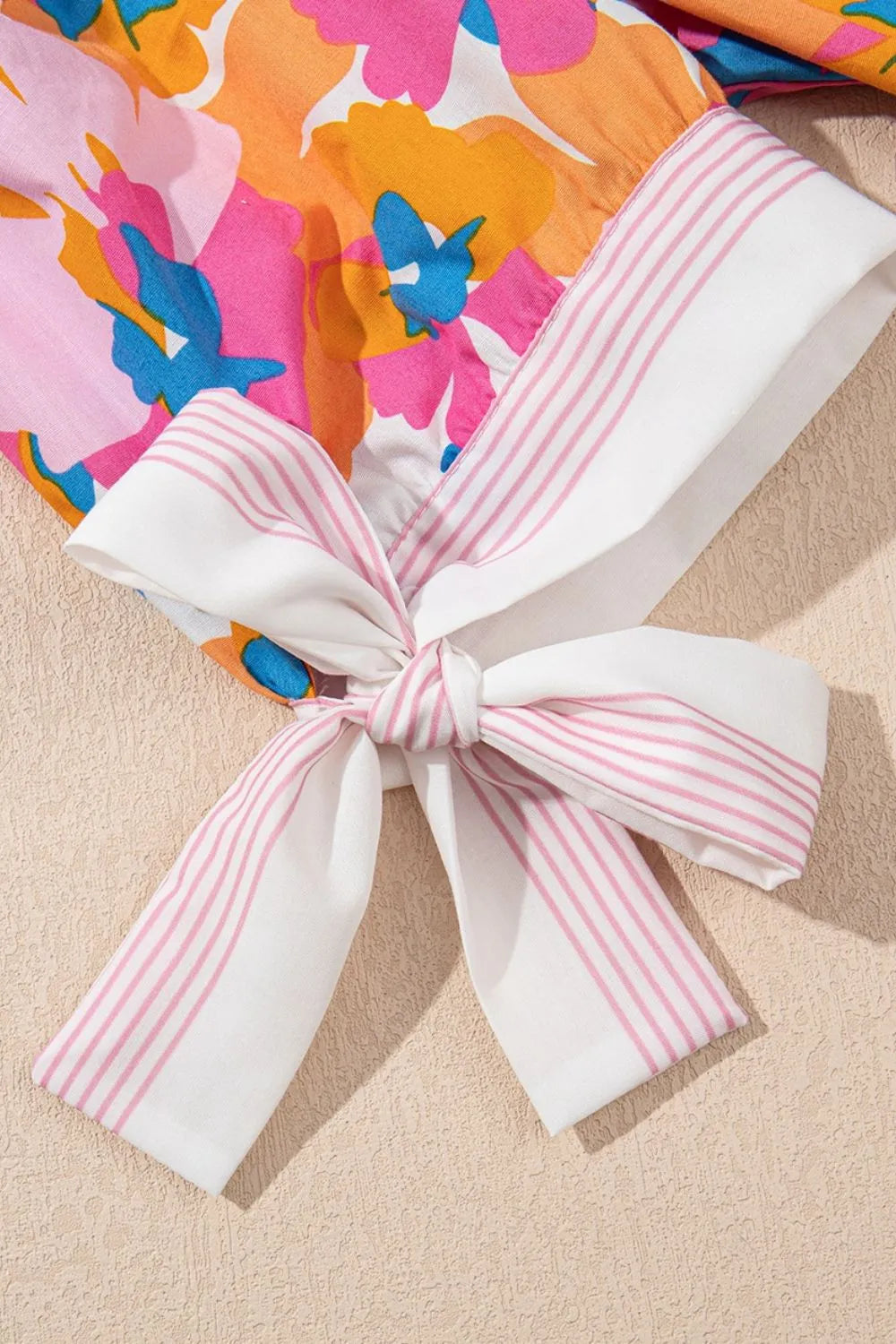 Floral Striped Edge V Neck Knotted Short Sleeve Blouse.