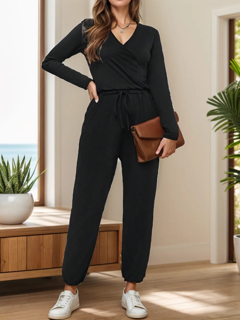 Surplice Tie Waist Long Sleeve Jumpsuit.