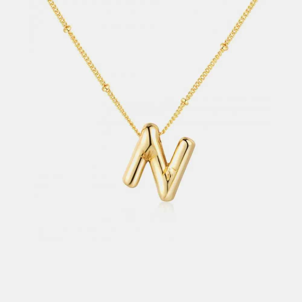 Gold-Plated Bubble Initial Necklace.