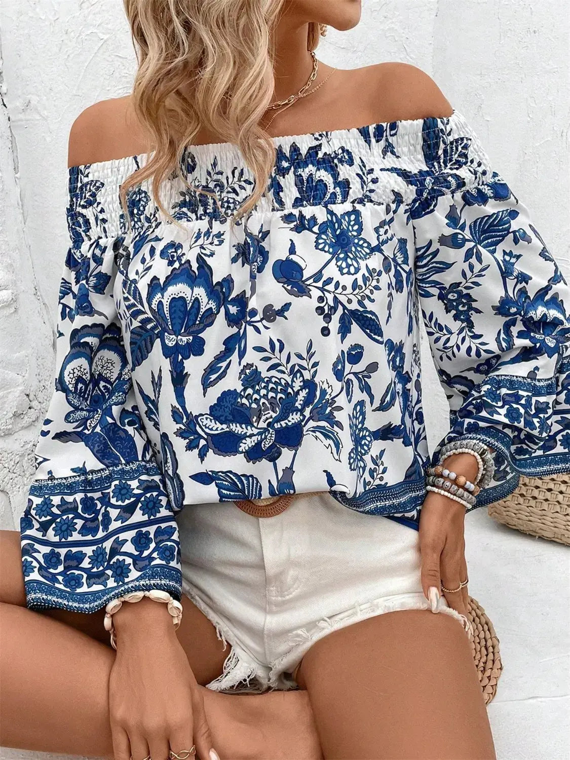 Smocked Printed Off-Shoulder Blouse.