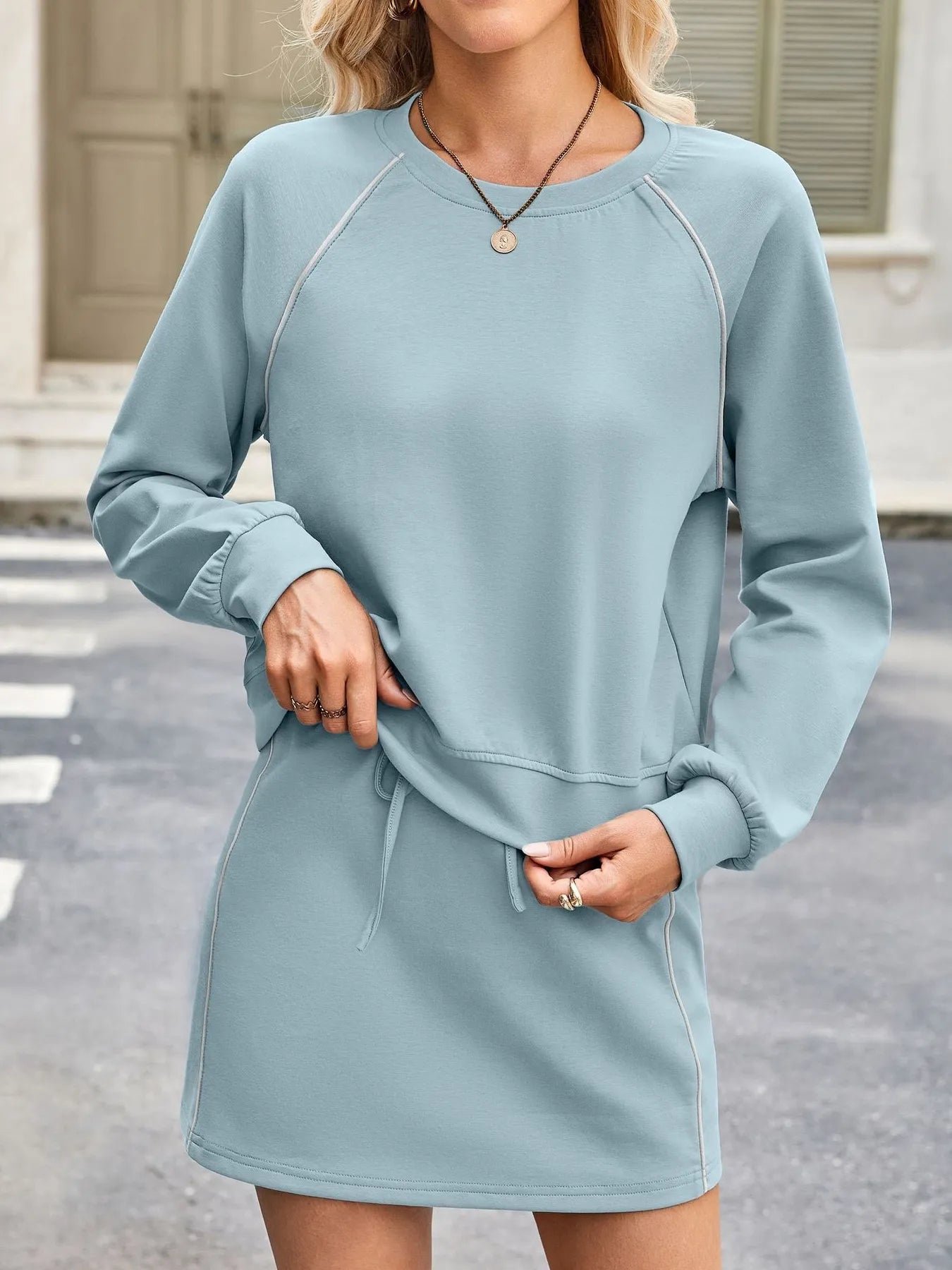 Round Neck Raglan Sleeve Top and Skort Set.