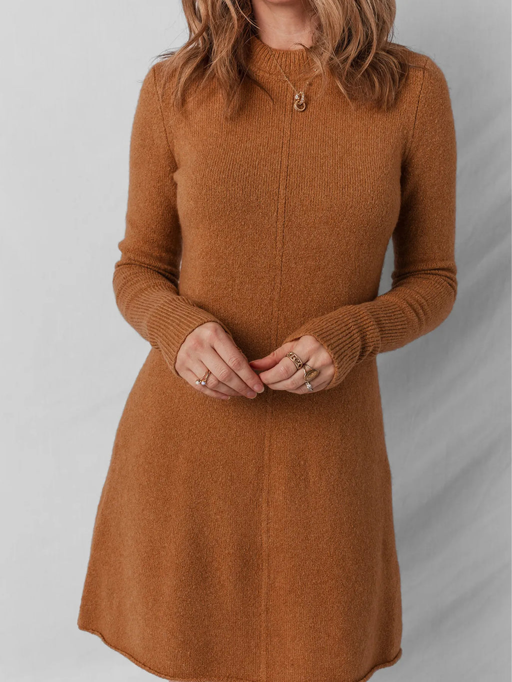 Ribbed Detail Solid Color Mini Sweater Dress.