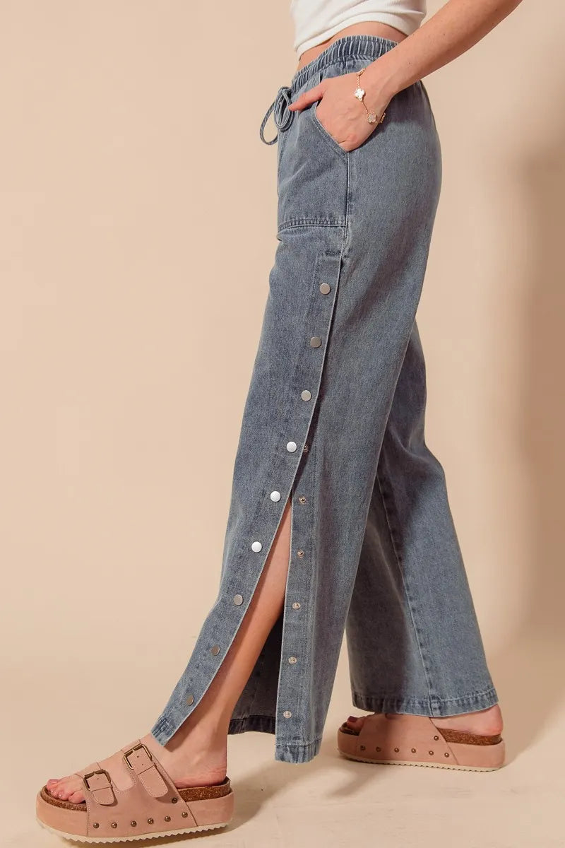 Mid Rise Drawstring Jeans with Side Snap Button.