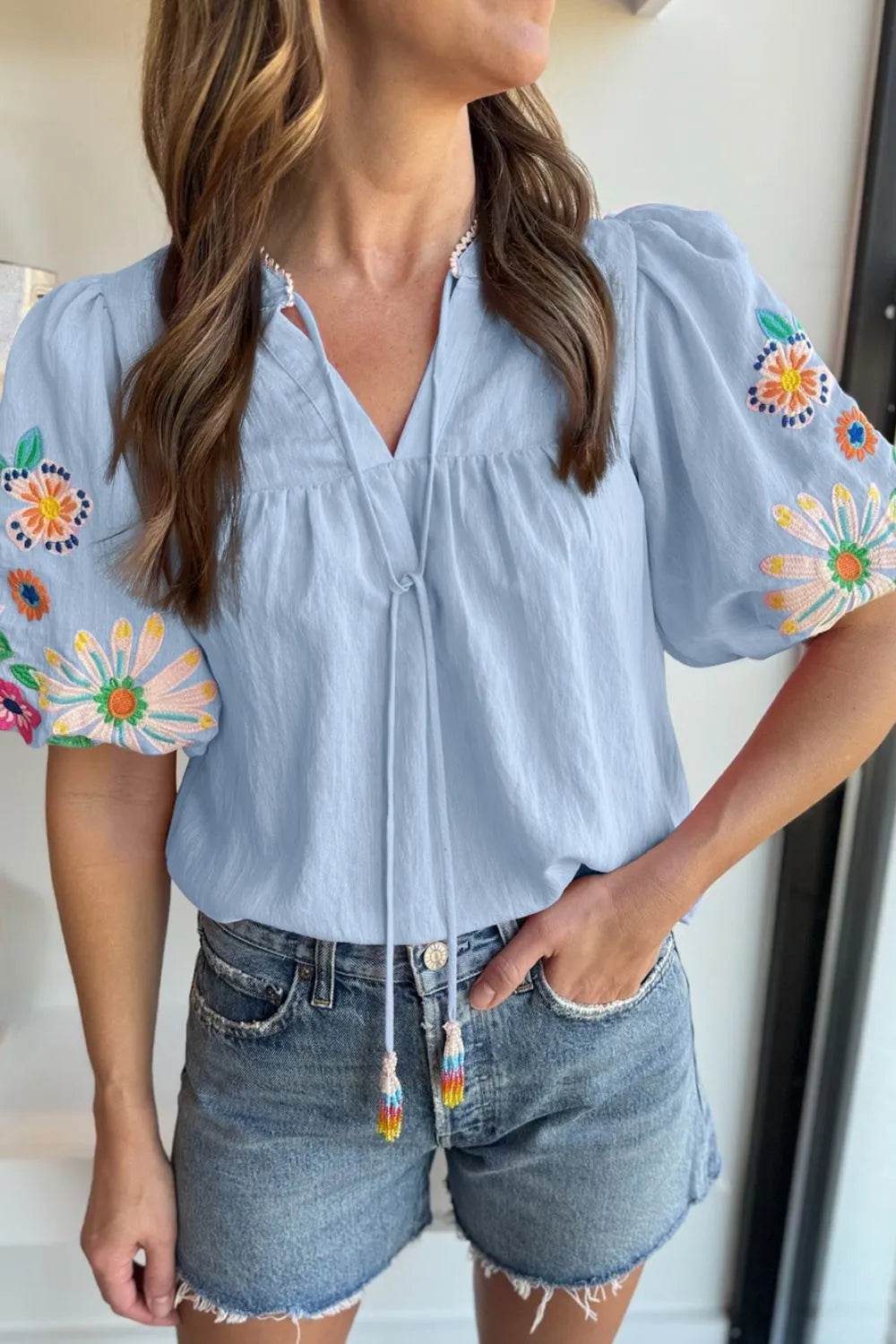 Embroidered Tie Neck Short Sleeve Blouse.