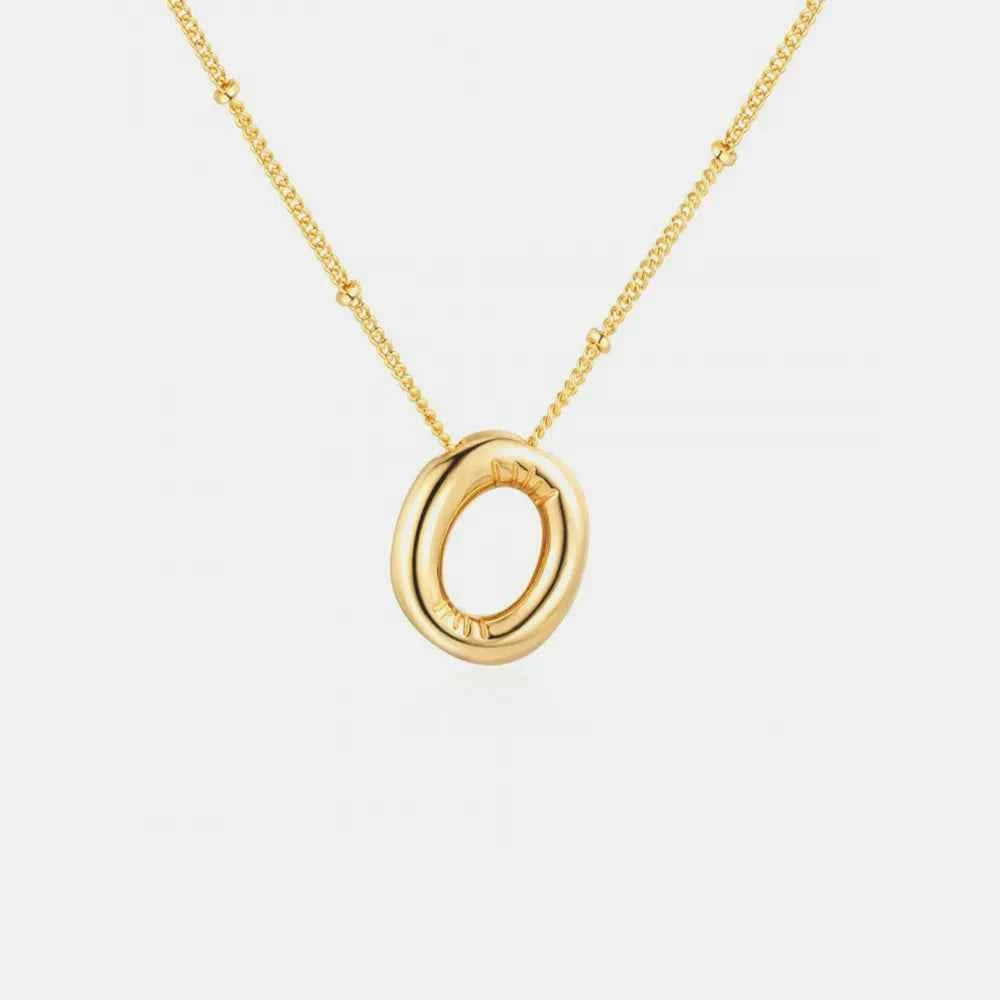 Gold-Plated Bubble Initial Necklace.