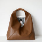 Spliced woven shoulder bag