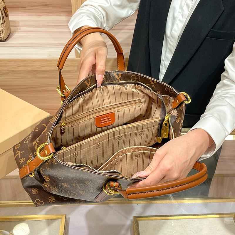Large capacity shoulder bag, genuine leather, suitable for commuting, hand-held, crossbody, or tote bag.