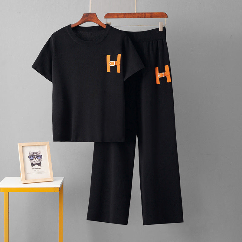 Two piece set of loose letter T-shirt and wide leg pants for women