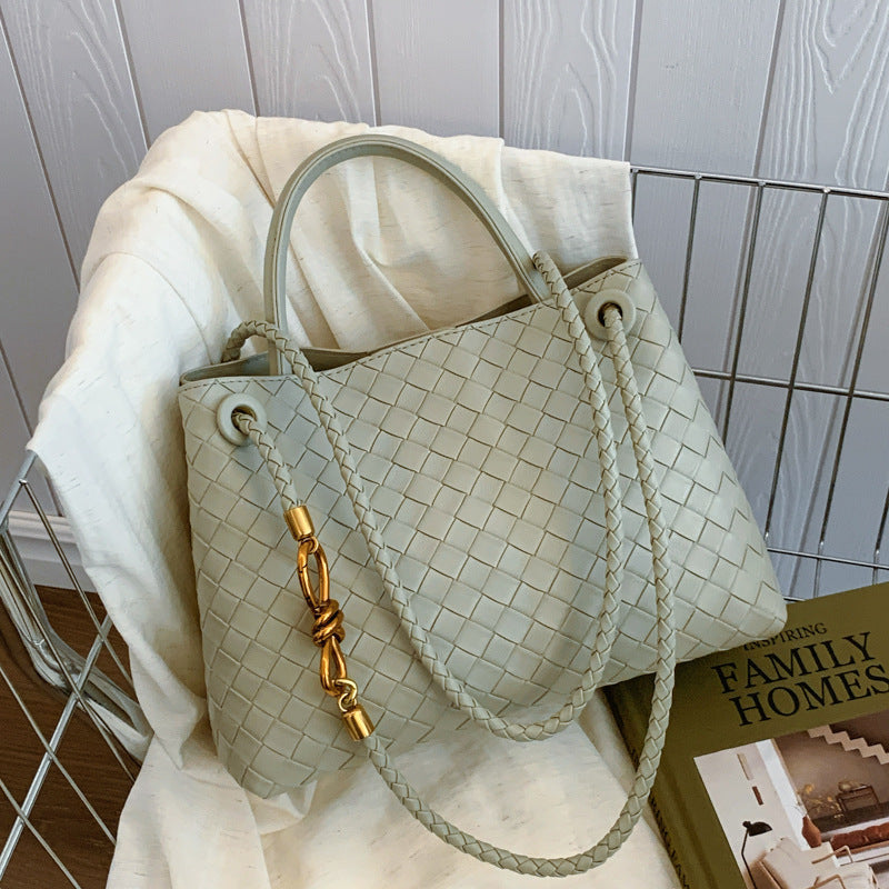 Metal rope buckle woven shoulder bag, fashionable, versatile, retro, commuter bag for women. eprolo