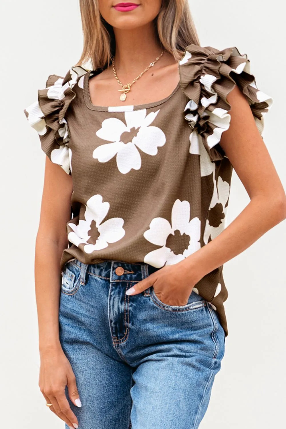 Floral Textured Ruffled Cap Sleeve Blouse.