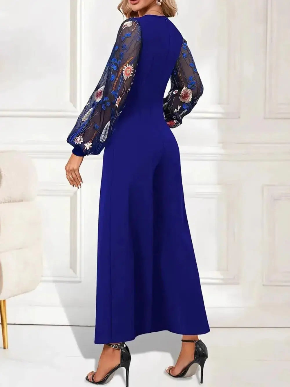 Surplice Embroidered Long Sleeve Wide Leg Jumpsuit.