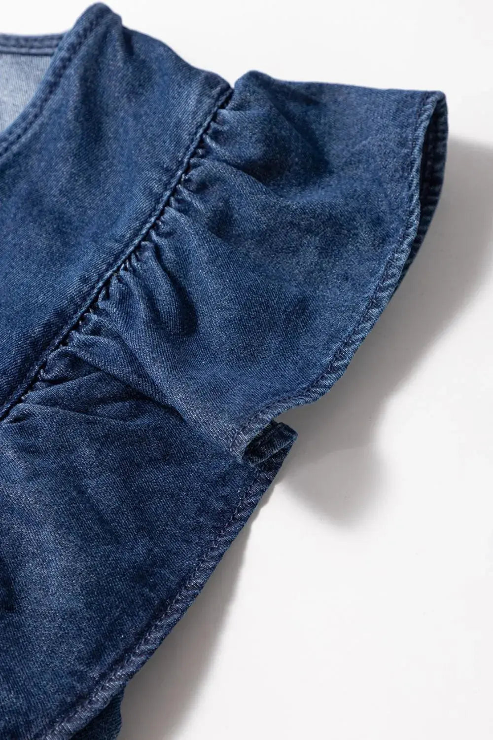 Denim Ruffled Zipped Front Belted Romper.