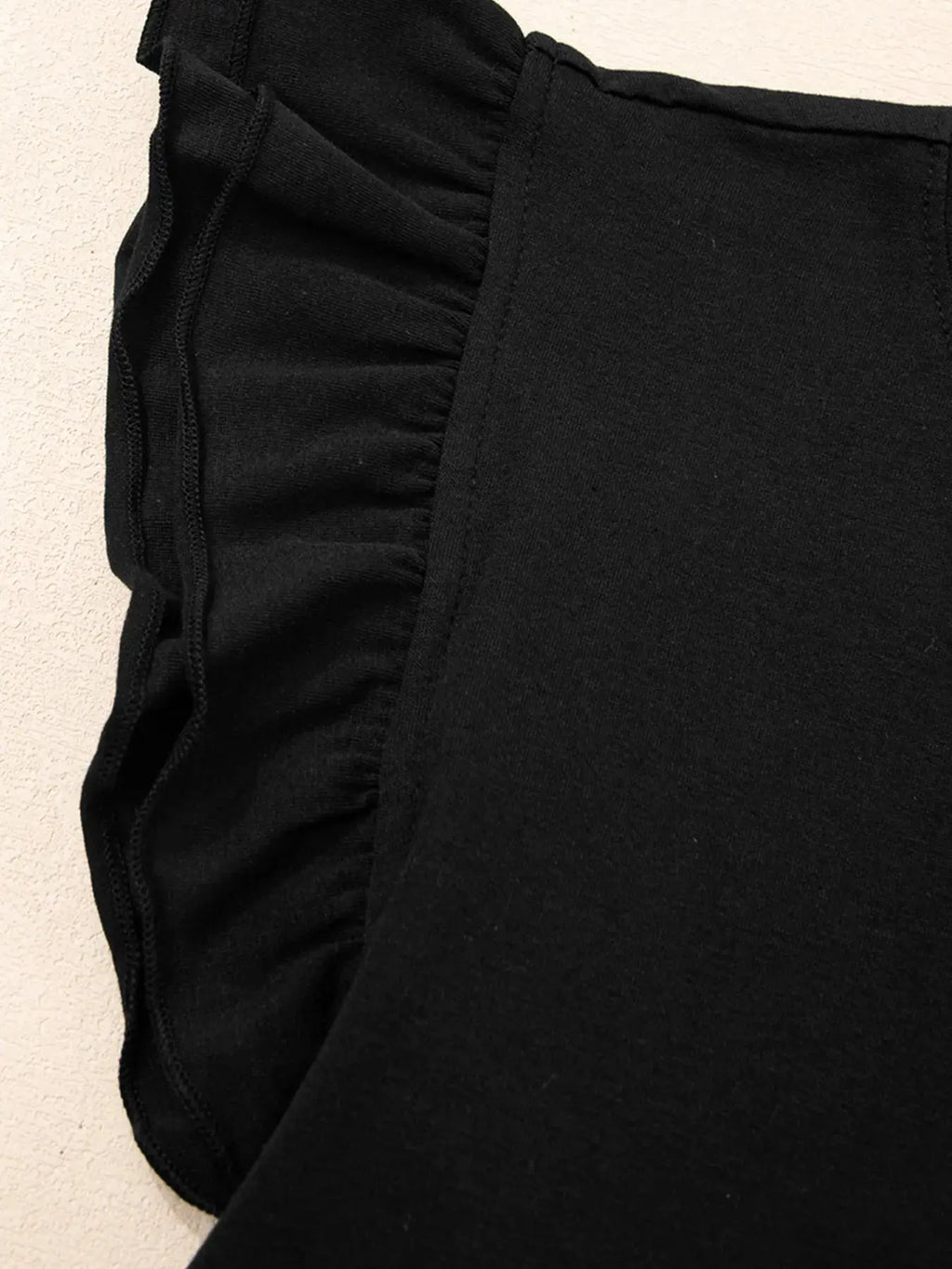 Ruffled Crew Neck Slim Fit Top.