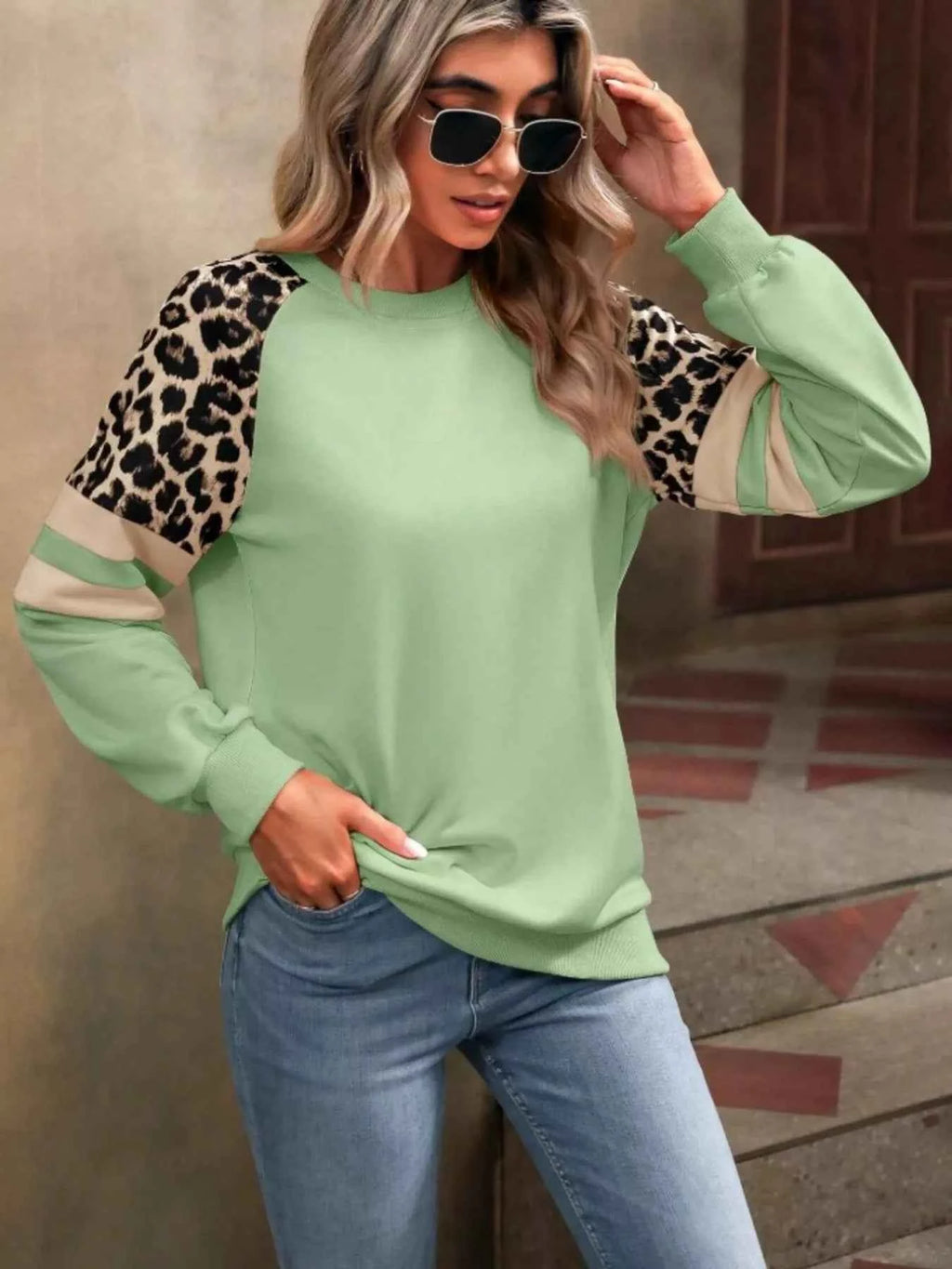 Leopard Round Neck Raglan Sleeve Sweatshirt.