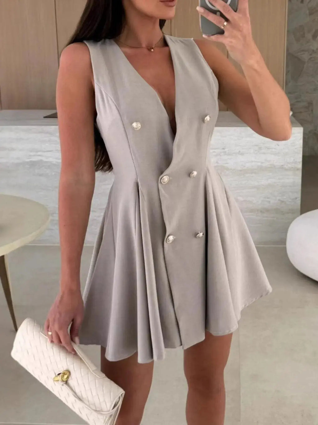 Sleeveless Double-Breasted Mini Dress.