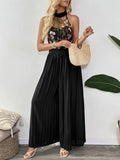 Floral Embroidered Halter Neck Pleated Jumpsuit.