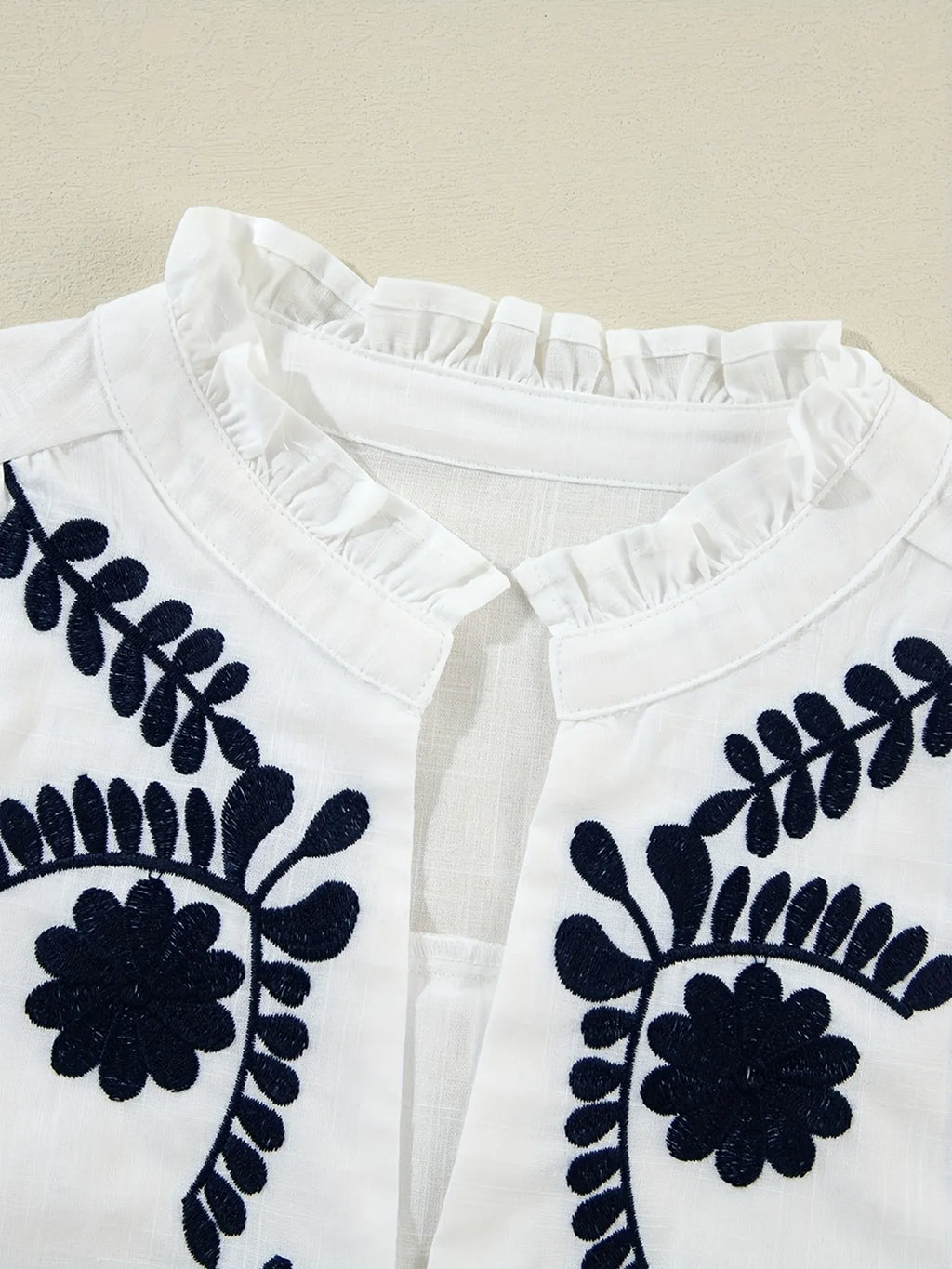 Embroidered Long Sleeve Blouse.