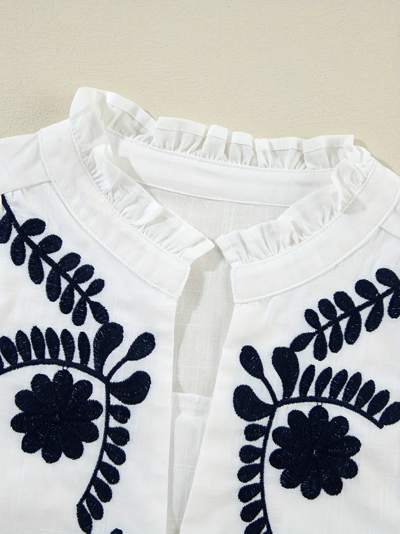 Embroidered Long Sleeve Blouse.