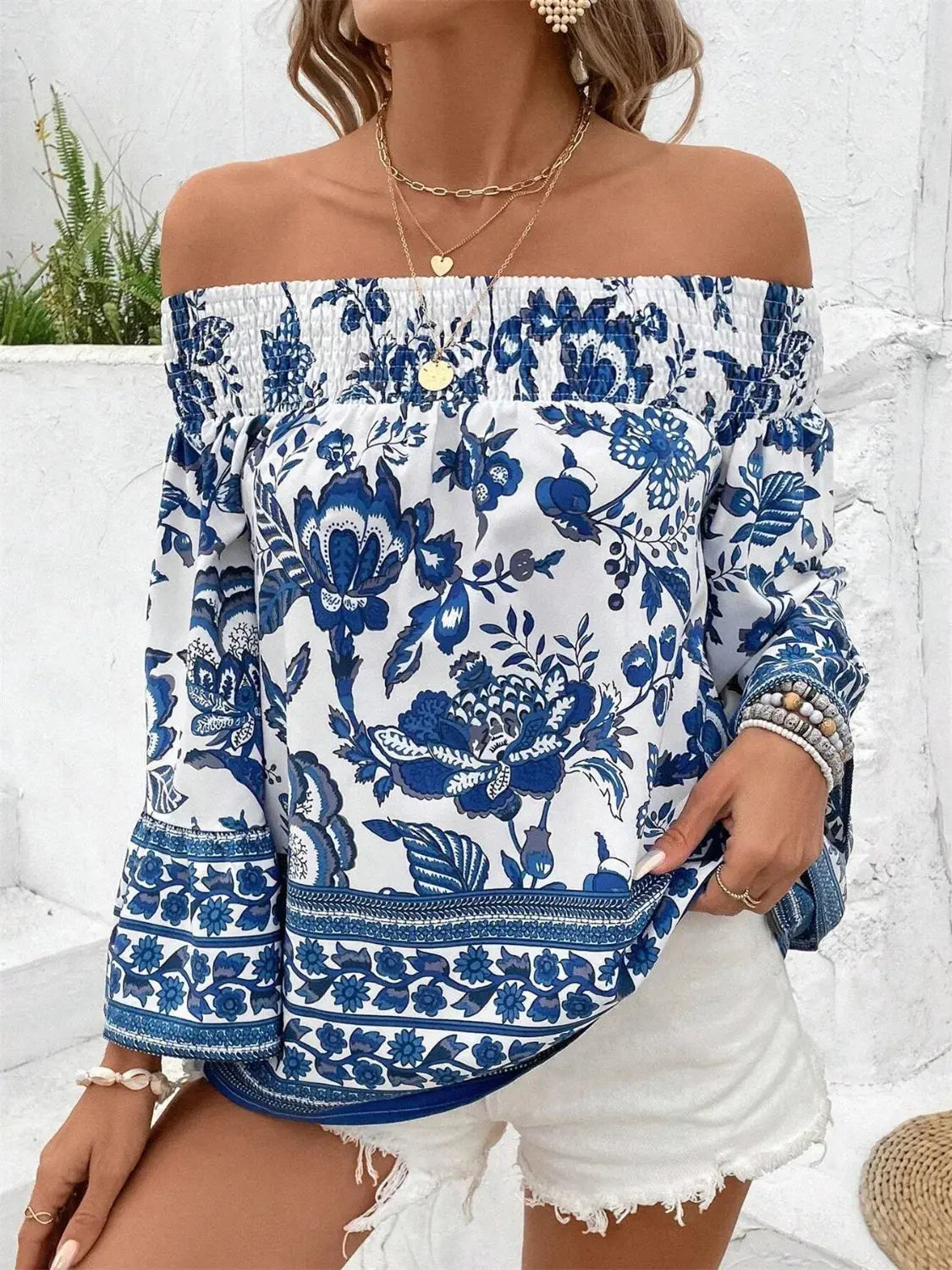 Smocked Printed Off-Shoulder Blouse.