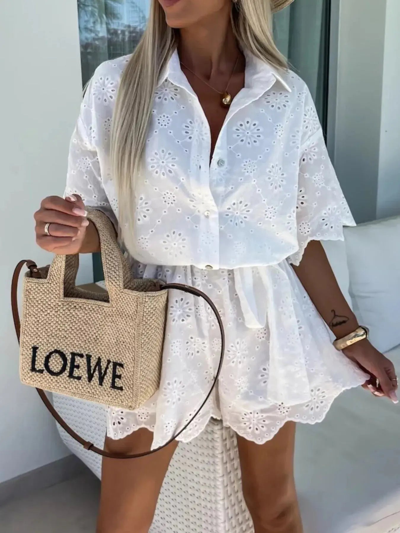 Eyelet Lace Button-Up Romper.