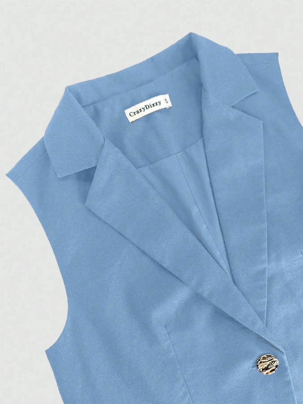 One Button Sleeveless Top and Pants Set.