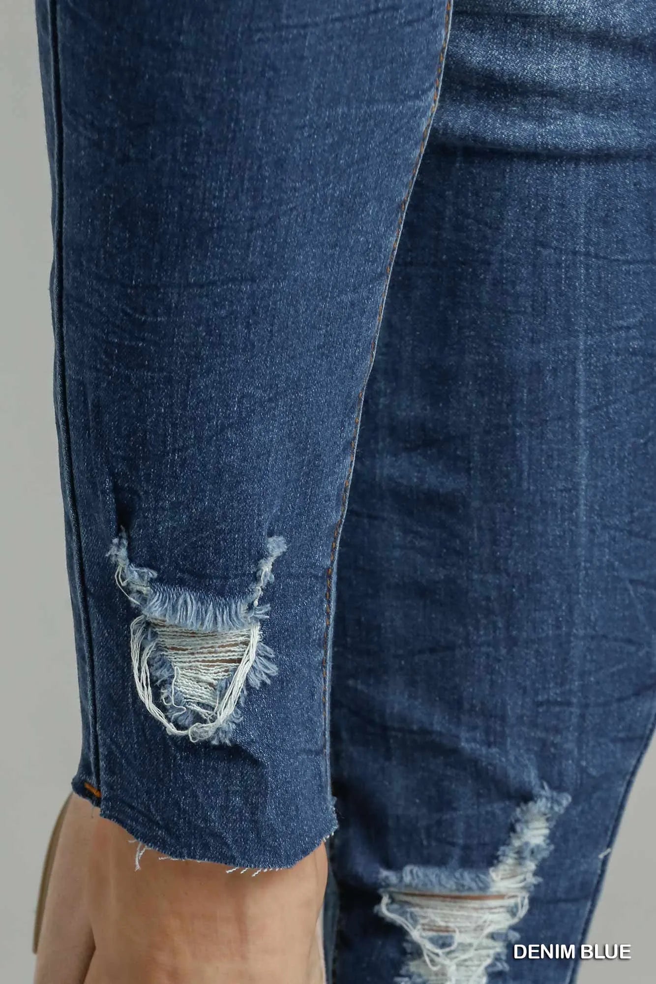 Umgee Distressed Skinny Jeans with Pockets.