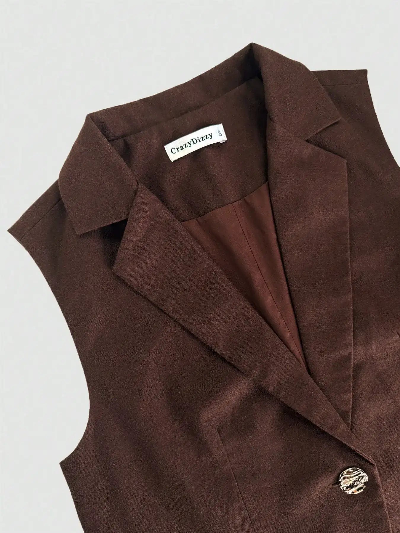 One Button Sleeveless Top and Pants Set.