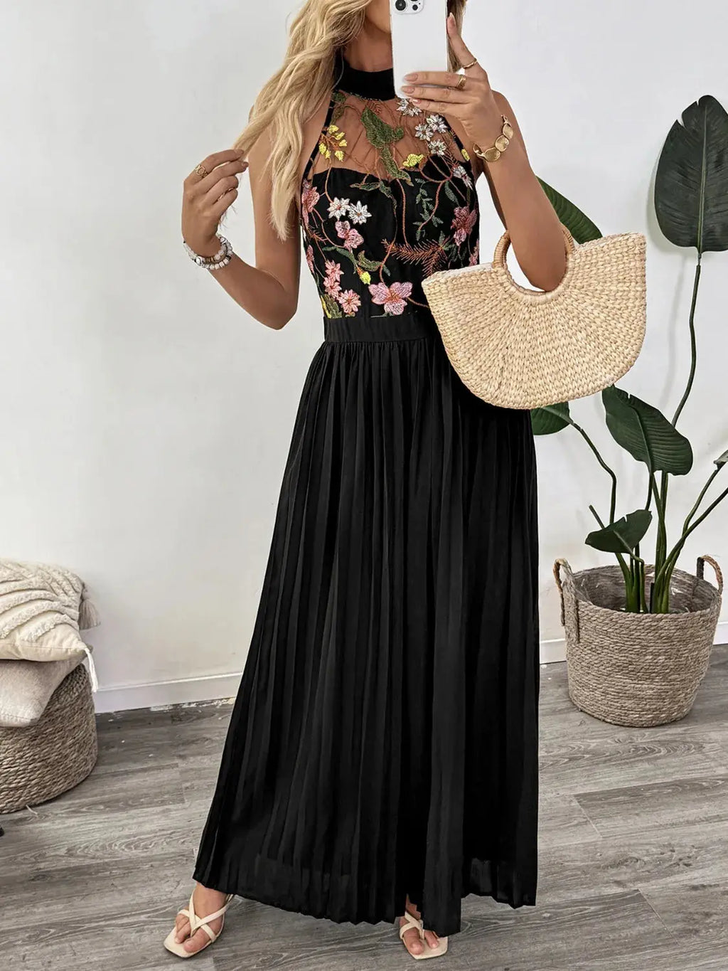 Floral Embroidered Halter Neck Pleated Jumpsuit.