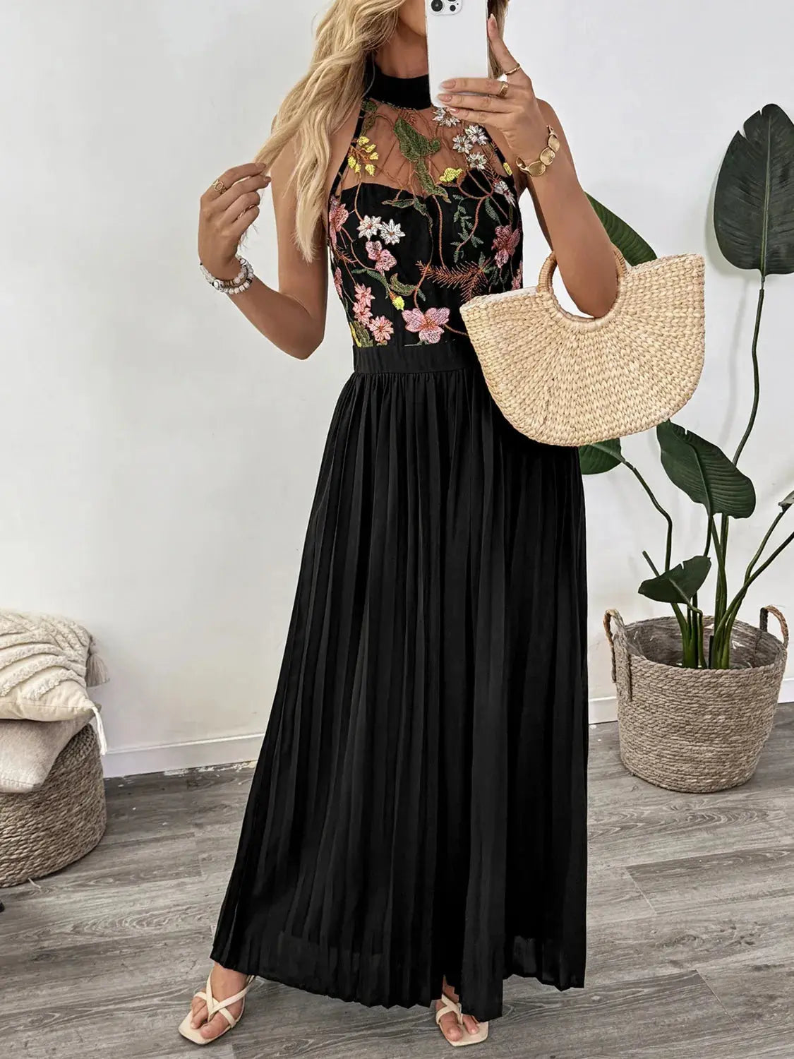 Floral Embroidered Halter Neck Pleated Jumpsuit.