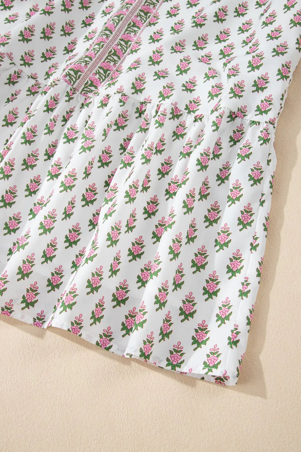 Puff Sleeve Tie Neck Ruffled Hem Dress.