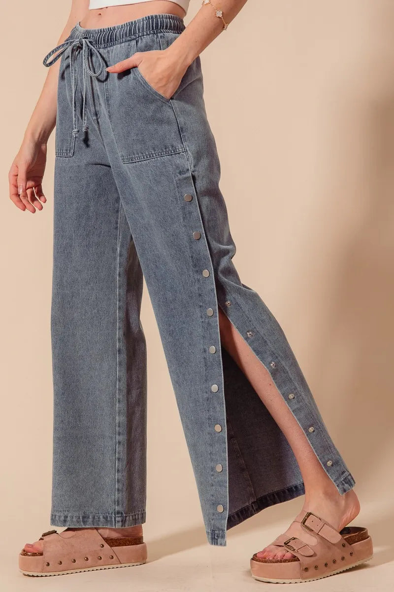 Mid Rise Drawstring Jeans with Side Snap Button.