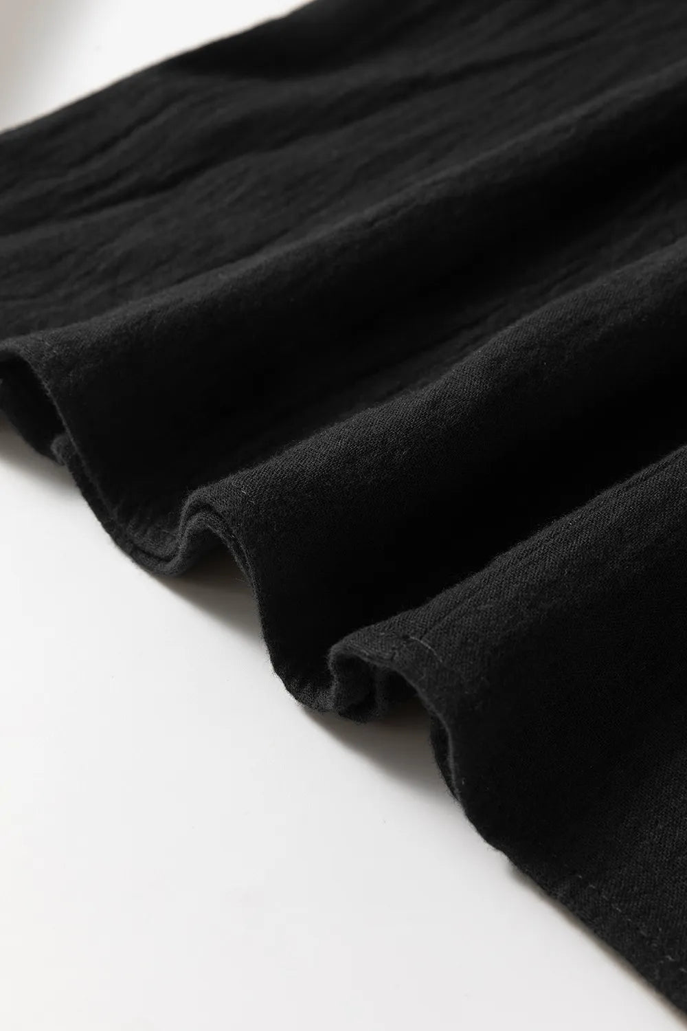 Ruffled Shoulder Notched Shift Tank Top.