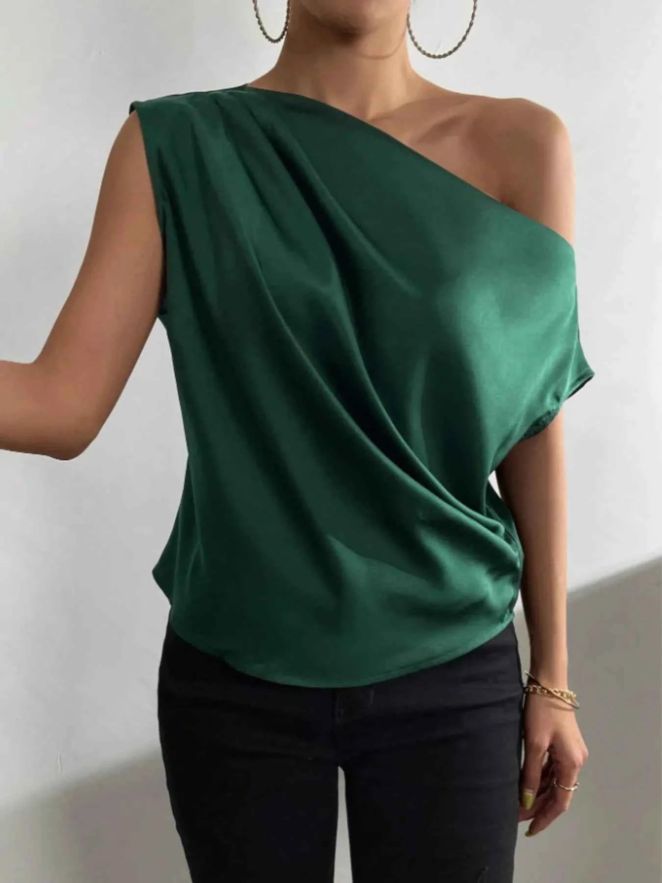 Asymmetrica One-Shoulder Draped Blouse.