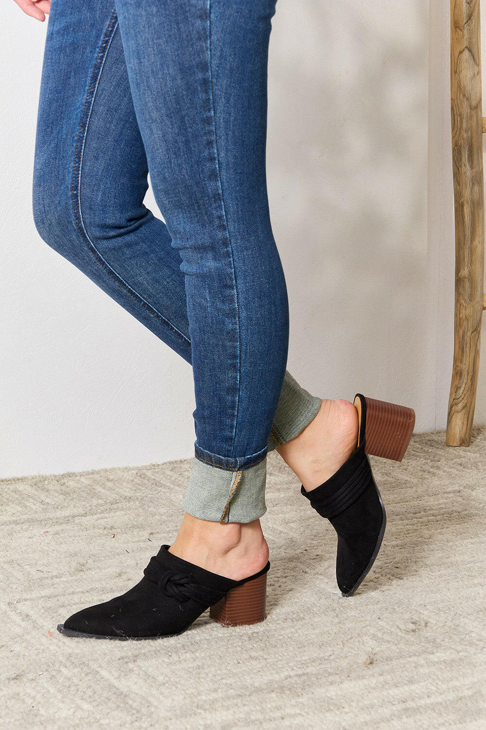 Pointed-Toe Braided Trim Mules.