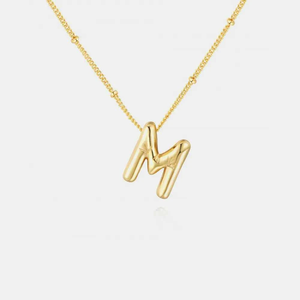 Gold-Plated Bubble Initial Necklace.