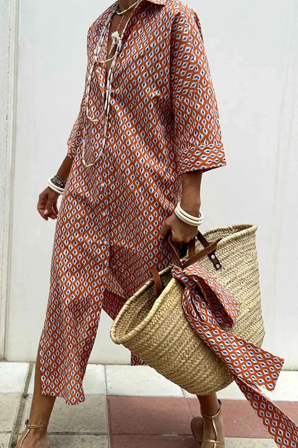 Tied Button Up Three-Quarter Sleeve Dress.