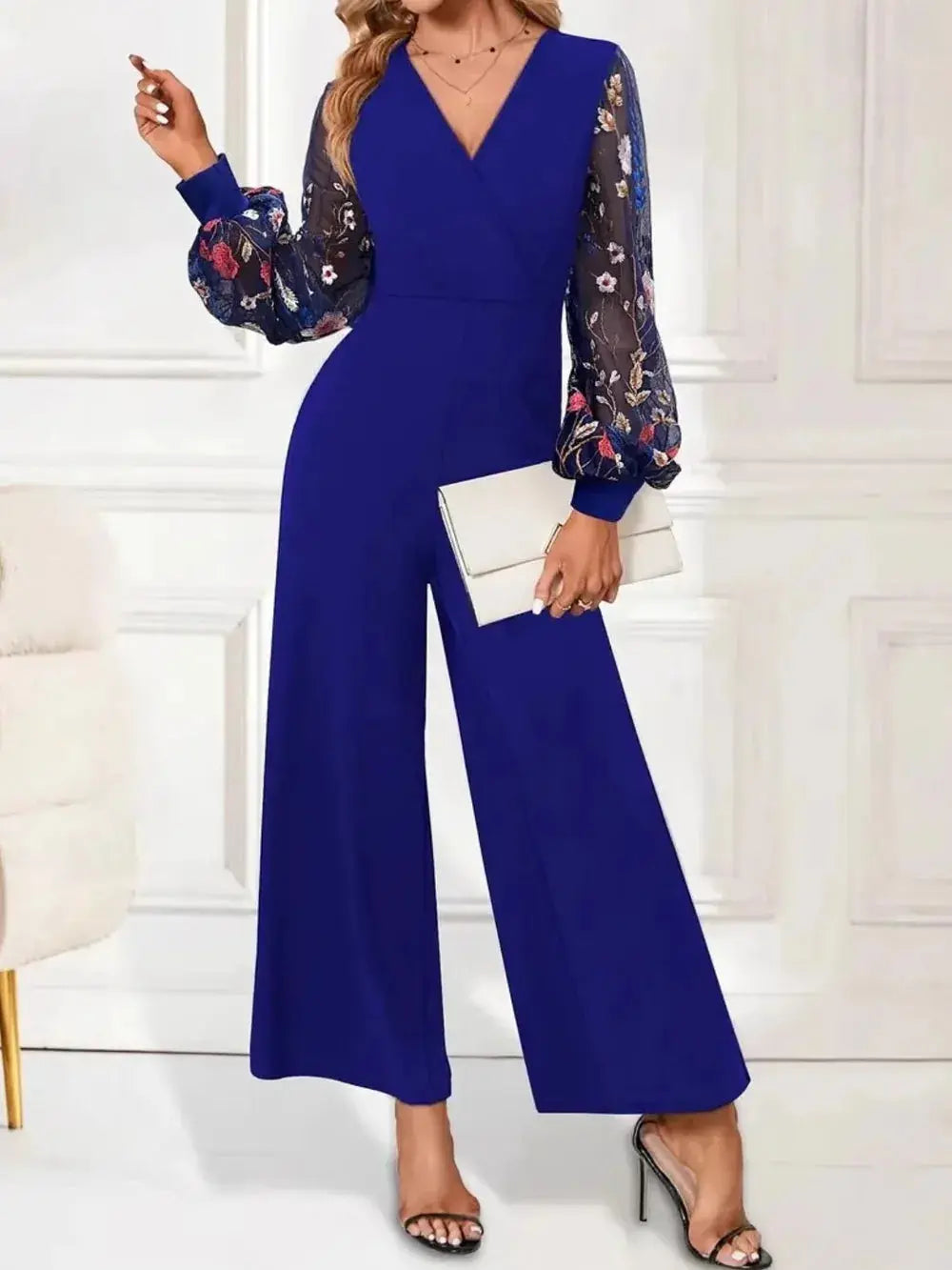 Surplice Embroidered Long Sleeve Wide Leg Jumpsuit.