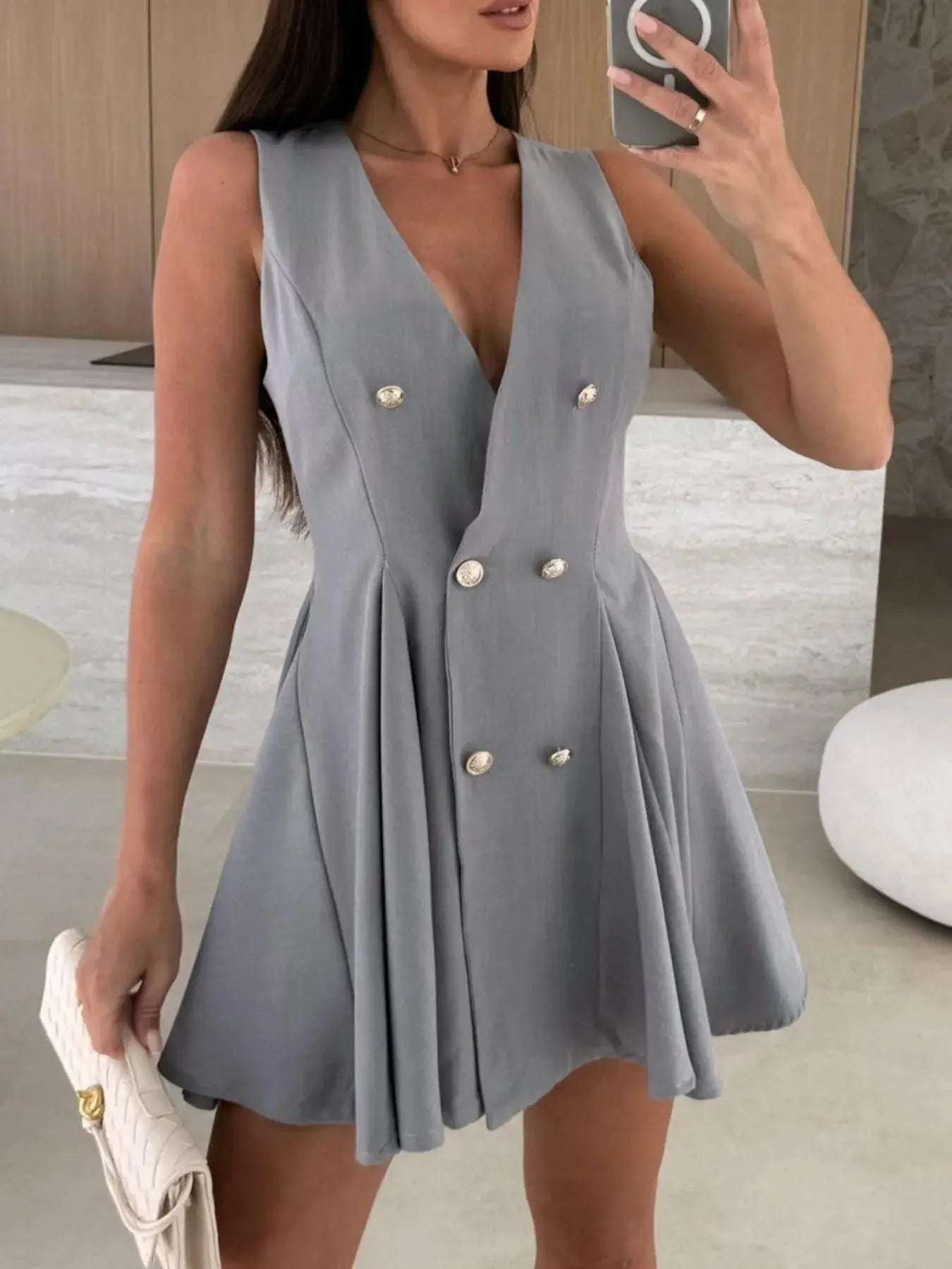 Sleeveless Double-Breasted Mini Dress.